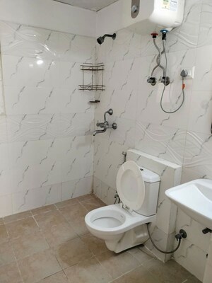 Bathroom in 3.5 BHK Apartment at Mahagun Moderne, Sector 78 – for Rent