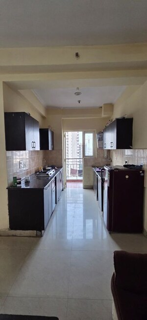 Kitchen in 2 BHK Apartment at Aims Golf City, Sector 75 – for Rent