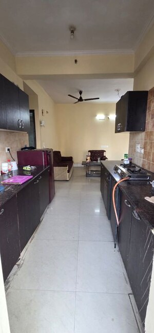 Kitchen in 2 BHK Apartment at Aims Golf City, Sector 75 – for Rent