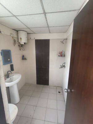 Bathroom in 2 BHK Apartment at Aims Golf City, Sector 75 – for Sale