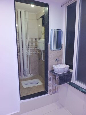Bathroom in 2 BHK Apartment at Adhya Radhakrishna, Moshi – for Rent