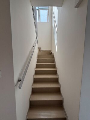 Staircase in 2 BHK Apartment at Gera Planet Of Joy, Kharadi – for Rent