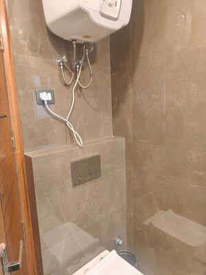 Bathroom in 4 BHK Builder Floor at Palam Vihar – for Sale