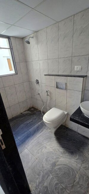 Bathroom in 4 BHK Apartment at Gera World of Joy, Kharadi – for Sale