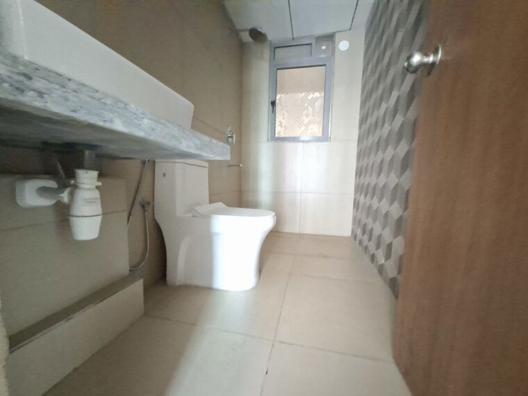 Bathroom, kalpataru-immensa-c 2 Bedroom 761 Sq.Ft. Apartment In Kolshet Road Thane 10694514