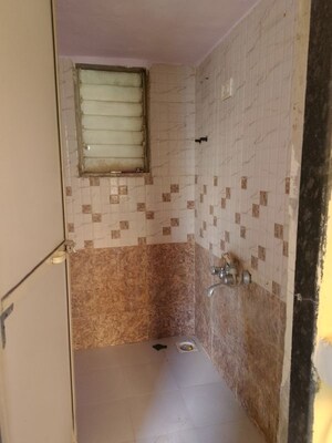Bathroom in 1 BHK Apartment at Navkar Building, Nalasopara West – for Rent