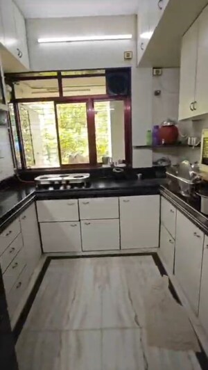 Kitchen in 2 BHK Apartment at Yashodhan Apartment Vile Parle, Vile Parle West – for Rent