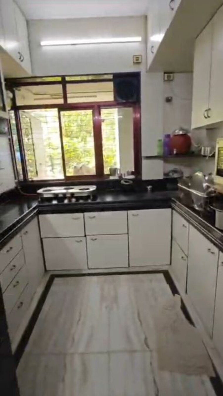 Kitchen, yashodhan-apartment-vile-parle 2 Bedroom 700 Sq.Ft. Apartment In Vile Parle West Mumbai 10694573