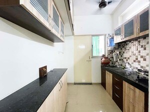 Kitchen in 2 BHK Apartment at Nava Naroda – for Sale