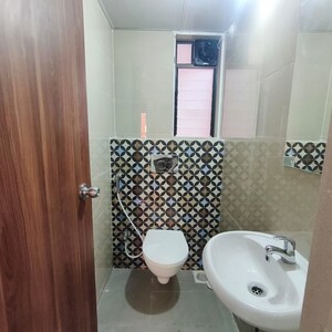 Bathroom in 1 BHK Apartment at Raunak Unnathi Woods Phase 7 A And B, Ghodbunder Road – for Rent