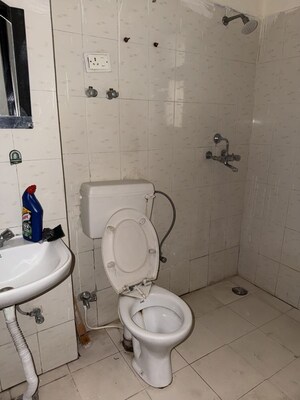 Bathroom in 2 BHK Apartment at Emenox Brave Hearts, Raj Nagar Extension – for Rent