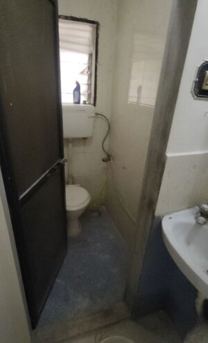 Bathroom in 1 BHK Apartment at Alguj CHS, Vasant Vihar – for Rent