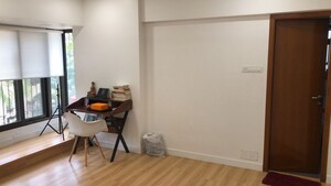 Living Room in 2 BHK Apartment at Lokhandwala Complex, Andheri West – for Rent