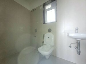 Bathroom in 2 BHK Apartment at Puranik City, Kasarvadavali – for Rent