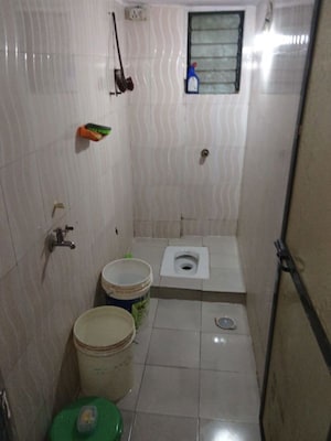 Bathroom in 1 BHK Apartment at Vighnaharta Complex Kalher, Kalher – for Rent
