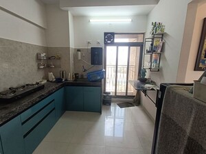 Kitchen in 3 BHK Apartment at Wadhwa Meadows, Khadakpada – for Sale