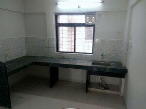 Kitchen in 2 BHK Apartment at Umang Homes & Primo Appartments, Wagholi – for Rent
