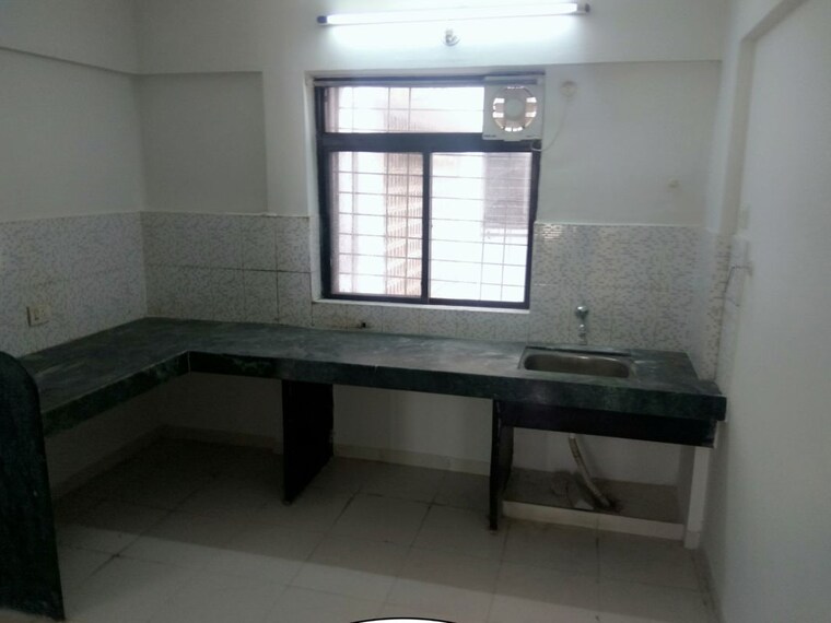 Kitchen, umang-homes-primo-appartments 2 Bedroom 750 Sq.Ft. Apartment In Wagholi Pune 10694913