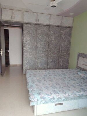 Bedroom in 2 BHK Apartment at Highland Tower, Lokhandwala – for Rent