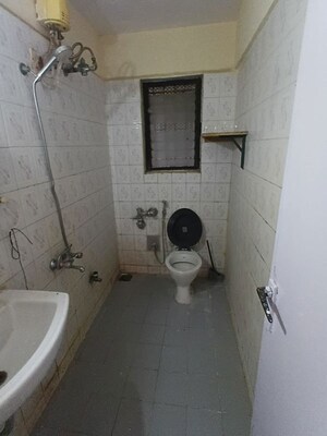 Bathroom in 3 BHK Apartment at Lokhandwala Whispering Palms, Kandivali East – for Rent