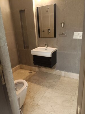 Bathroom in 4 BHK Builder Floor at Maharani Bagh – for Sale