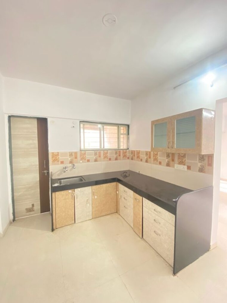 Kitchen, rajheramba-one-hallmark-avenue 2 Bedroom 815 Sq.Ft. Apartment In Ravet Pune 10694983