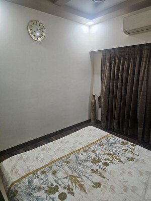 Bedroom in 3 BHK Apartment at RNA NG Eclat, Andheri West – for Rent