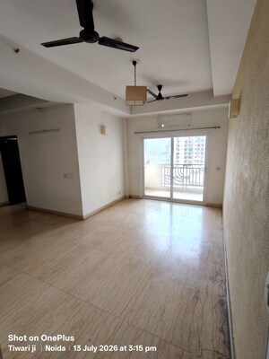 Living Room in 2.5 BHK Apartment at Mahagun Moderne, Sector 78 – for Rent