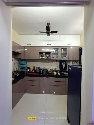 Kitchen in 2 BHK Apartment at Cosmos Habitat, Majiwada – for Rent