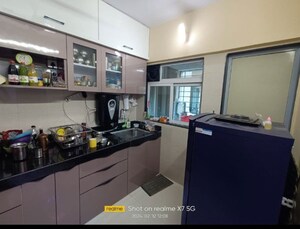 Kitchen in 2 BHK Apartment at Cosmos Habitat, Majiwada – for Rent