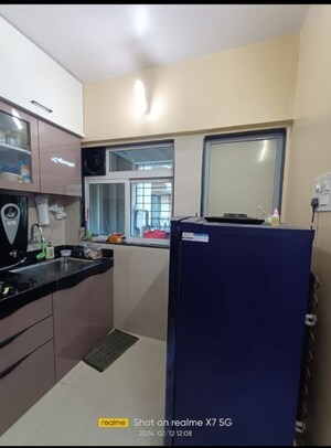 Kitchen in 2 BHK Apartment at Cosmos Habitat, Majiwada – for Rent