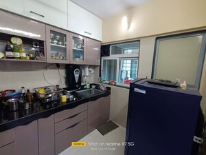 Kitchen in 2 BHK Apartment at Cosmos Habitat, Majiwada – for Rent