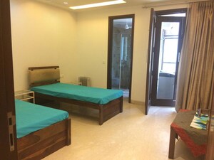 Bedroom in 3 BHK Builder Floor at Vasant Vihar – for Sale