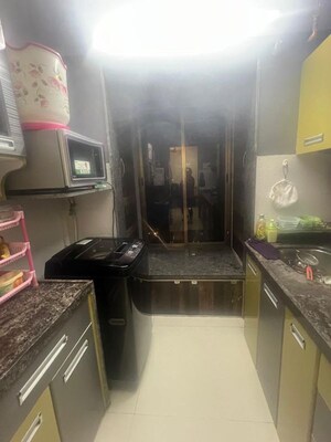 Kitchen in 2 BHK Apartment at M.K Morya Heights, Kharghar – for Rent