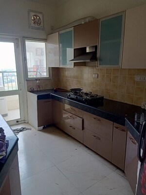 Kitchen in 3.5 BHK Apartment at AWHO Shanti Vihar, Sector 95 – for Rent
