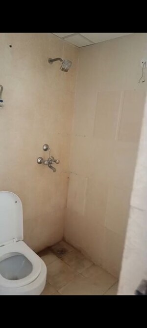 Bathroom in 2.5 BHK Apartment at Nilaya Greens, Raj Nagar Extension – for Sale