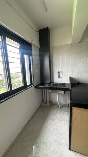 Kitchen in 3 BHK Apartment at Shamraj Trident, Dhankawadi – for Rent