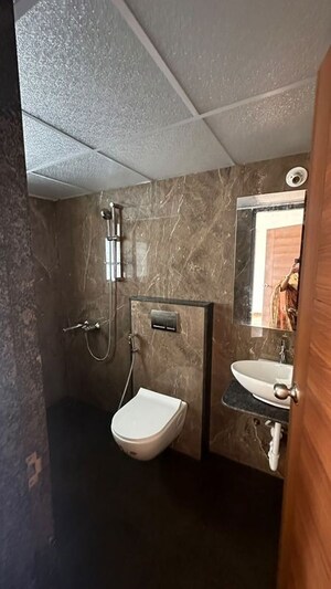 Bathroom in 3 BHK Apartment at Shamraj Trident, Dhankawadi – for Rent