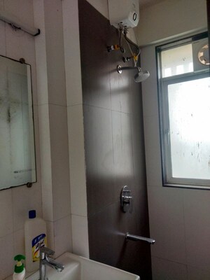 Bathroom in 1 BHK Apartment at Godrej Tranquil, Kandivali East – for Rent