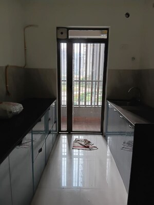 Kitchen in 2 BHK Apartment at Kalpataru Paramount, Kapur Bawdi – for Rent