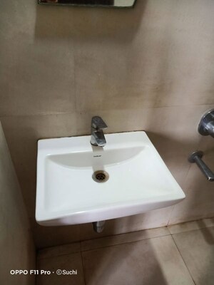Bathroom in 1 BHK Apartment at Puranik Hometown, Ghodbunder Road – for Rent