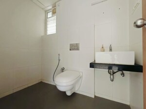 Bathroom in 2 BHK Apartment at Godrej Emerald, Ghodbunder Road – for Rent
