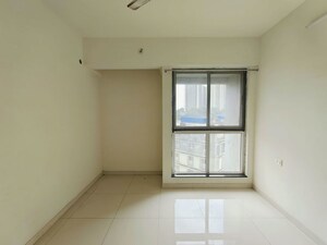 Room in 2 BHK Apartment at Godrej Emerald, Ghodbunder Road – for Rent