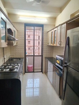Kitchen in 2 BHK Apartment at Lake Primrose, Powai – for Rent
