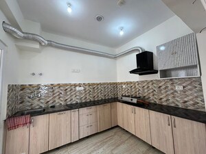 Kitchen in 3 BHK Apartment at ATS Rhapsody, Sector 1 Greater Noida – for Rent