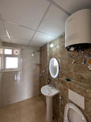 Bathroom in 3 BHK Apartment at ATS Rhapsody, Sector 1 Greater Noida – for Rent
