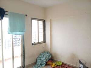 Bedroom in 2 BHK Apartment at Charholi Budruk – for Sale