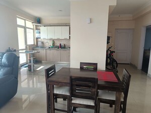 Dining area in 3.5 BHK Apartment at Raheja Vedaanta, Sector 108 – for Sale
