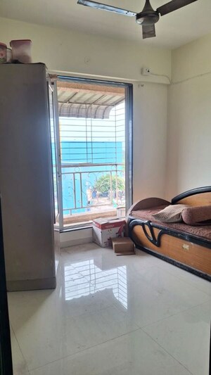 Living Room in 2 BHK Apartment at Shreeji Callisto, Ulwe Sector 3 – for Rent