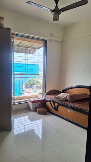 Living Room in 2 BHK Apartment at Shreeji Callisto, Ulwe Sector 3 – for Rent